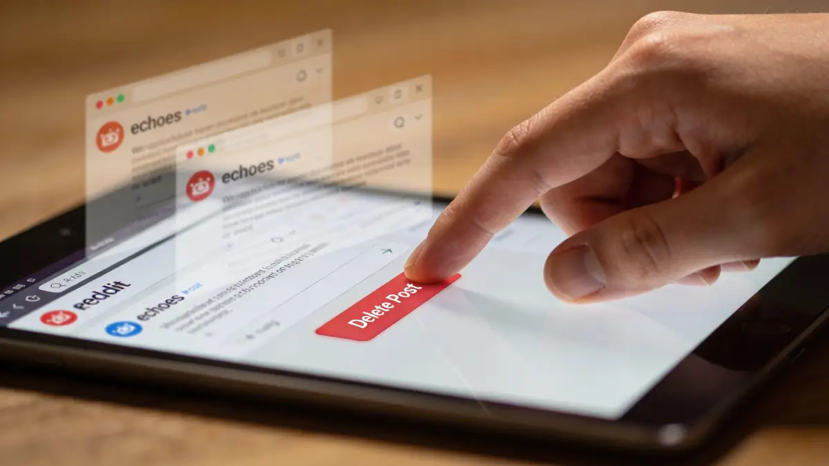 A person using a finger to tap a delete post button on a digital tablet screen.